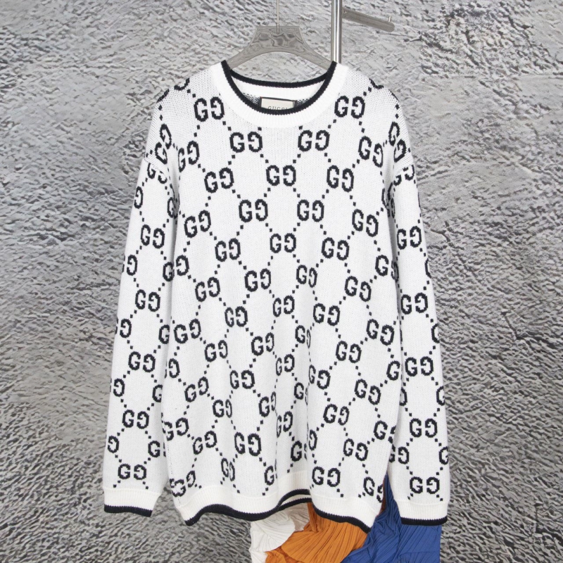 G*u*i sweaters